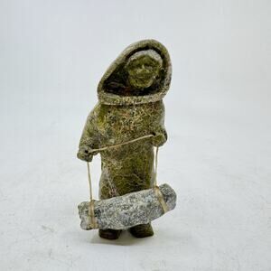 Inuit Handmade Sculpture of Standing Woman with Bedroll by Arci Ishulutuq